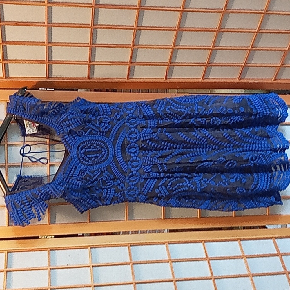 Beautiful lined black and blue sleeveless dress. Size 0